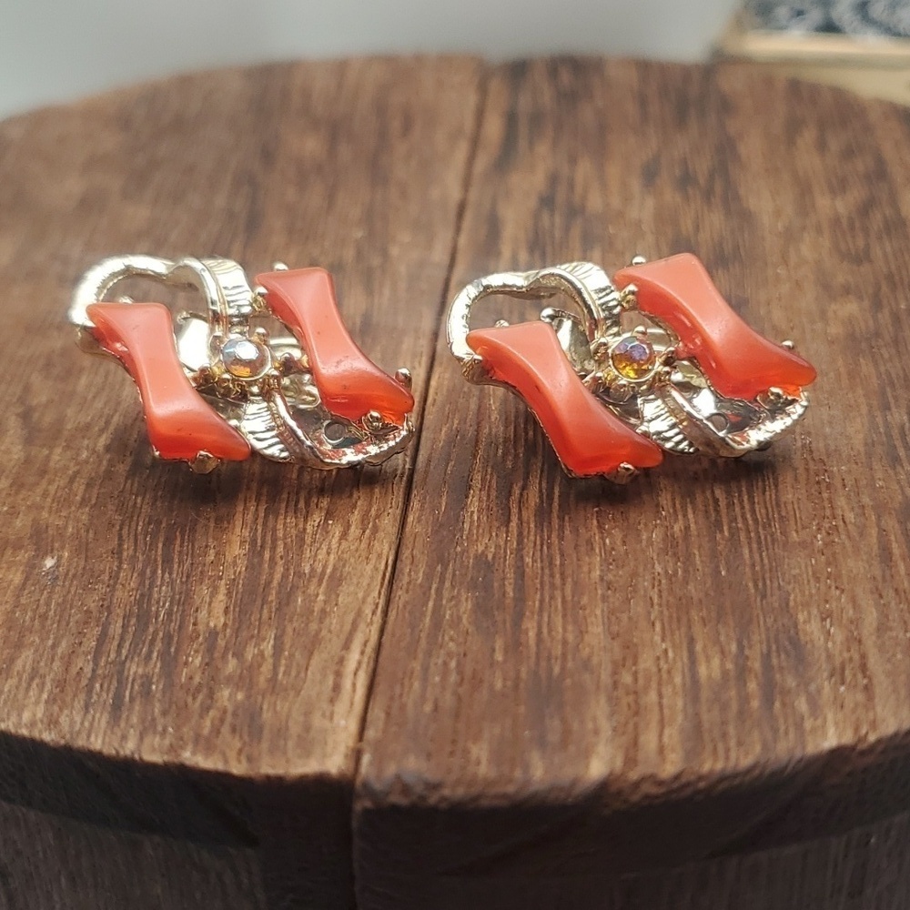Orange thermoset crystal clip on earrings E629